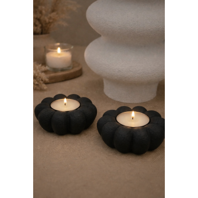 Waxinelichtje bloem zwart